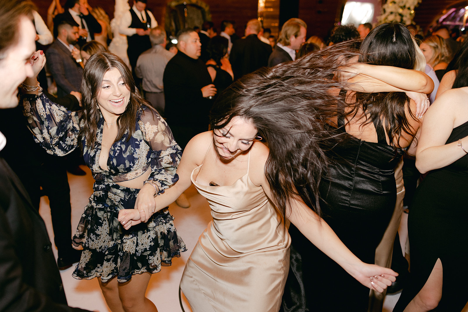 Bridesmaid dancing during reception 