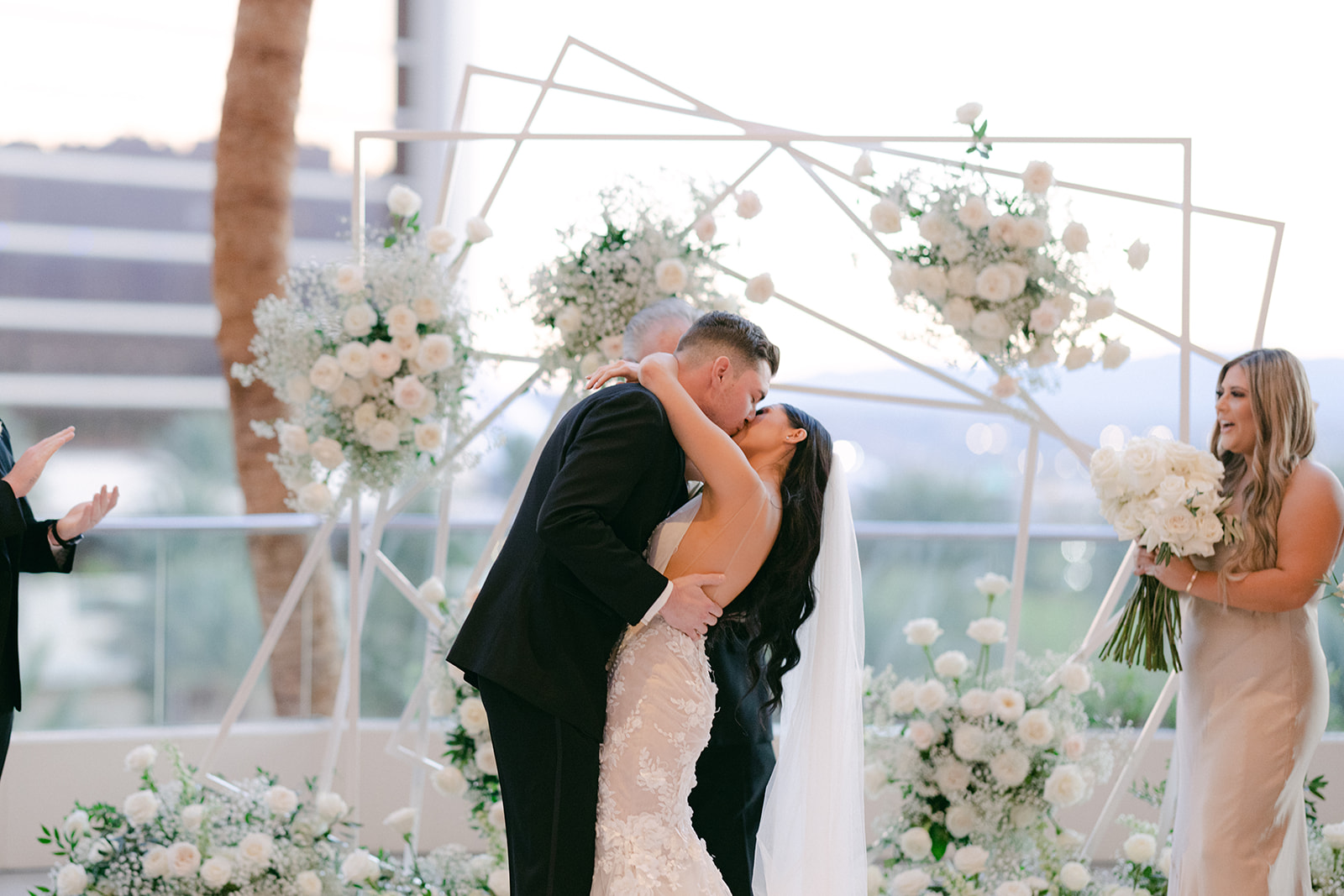 Newlyweds kissing for ceremony 