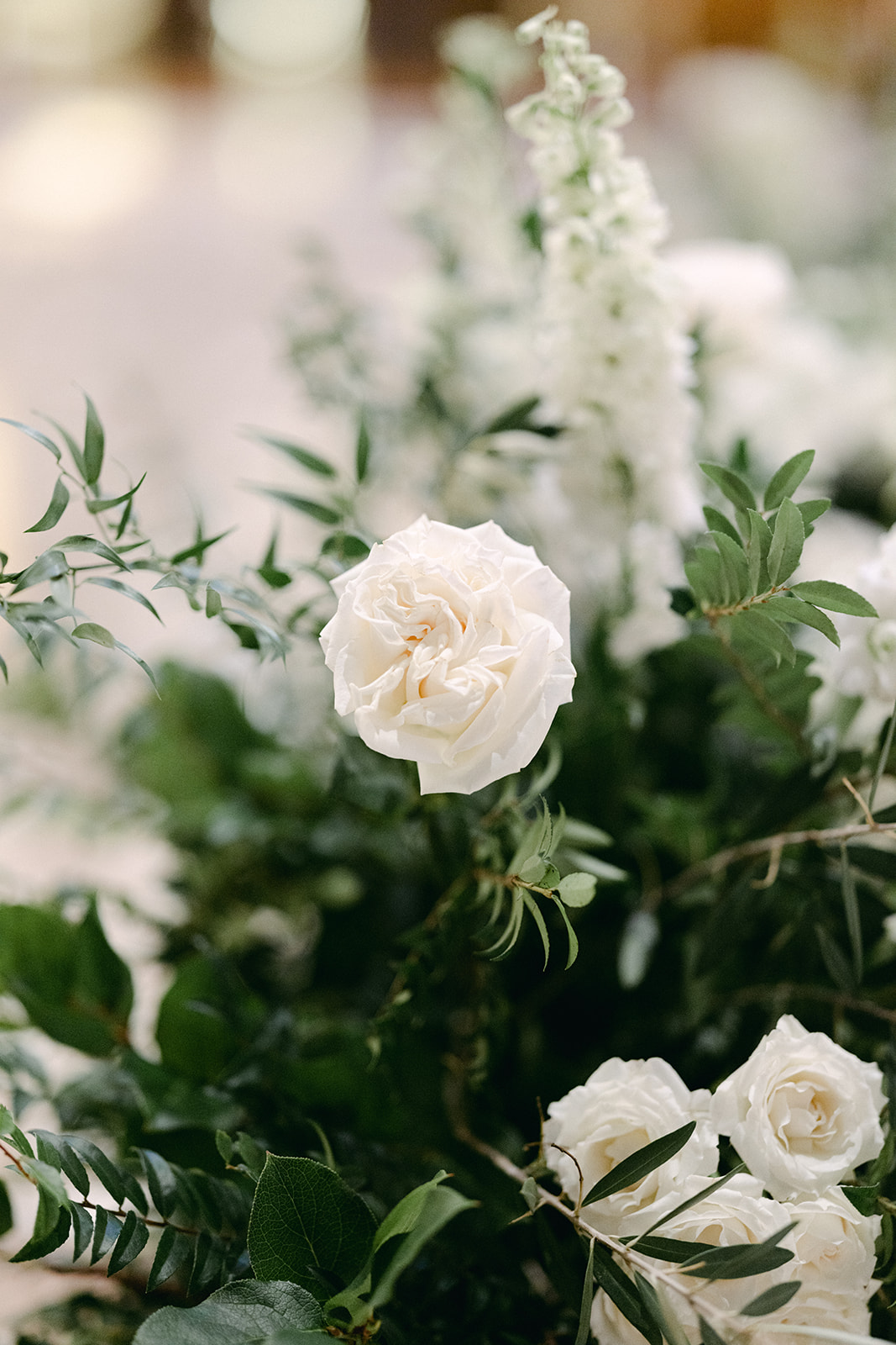 White rose with greenery for wedding florals 