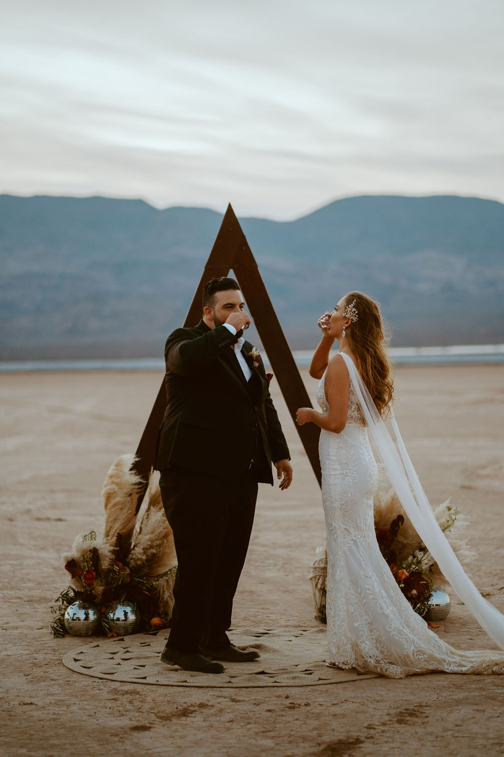 Couple Taking Shots for Unity Shot Ceremony in Las Vegas Dry Lake Bed 