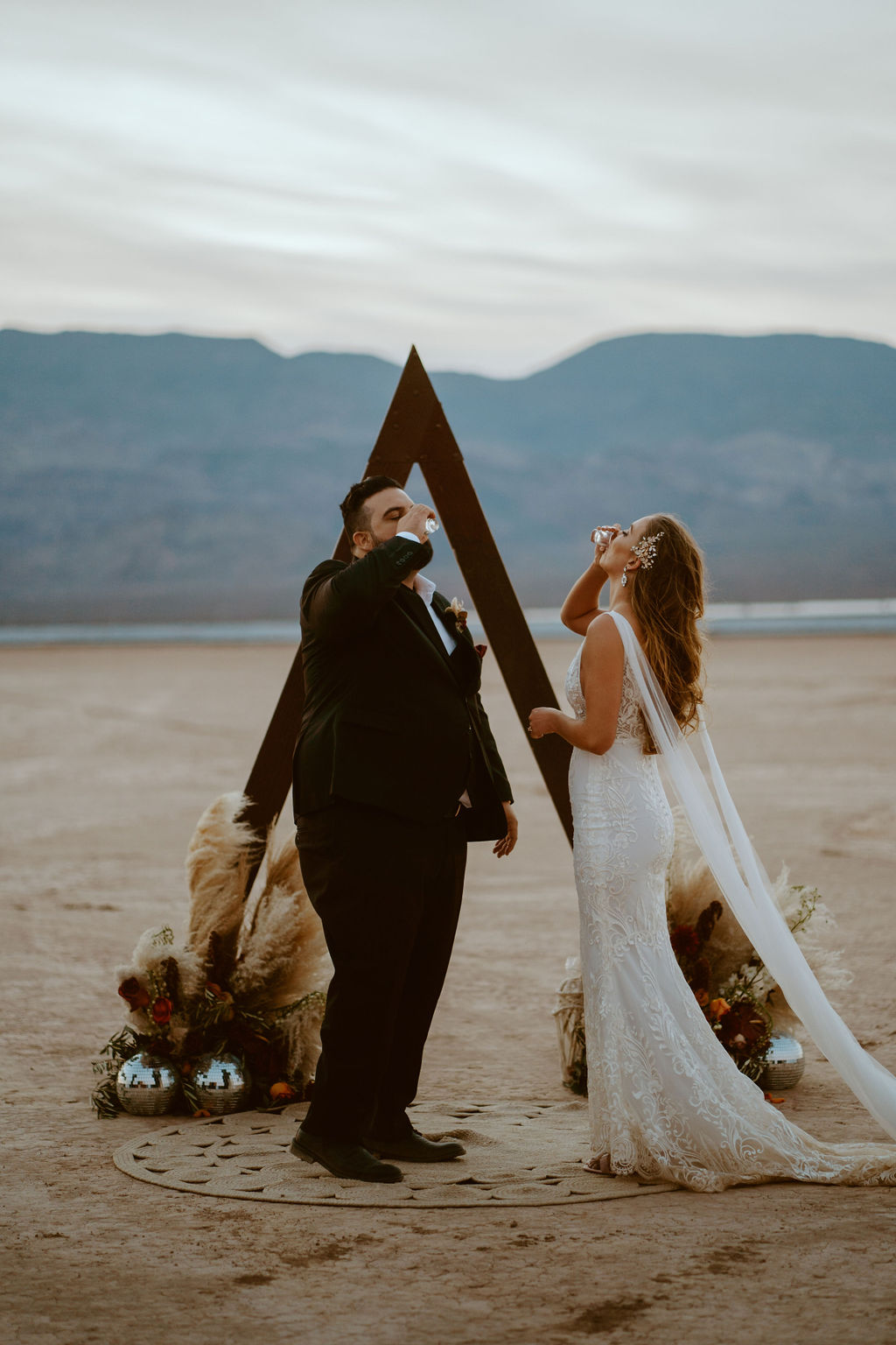 Couple Taking Shots for Unity Shot Ceremony in Las Vegas Desert 