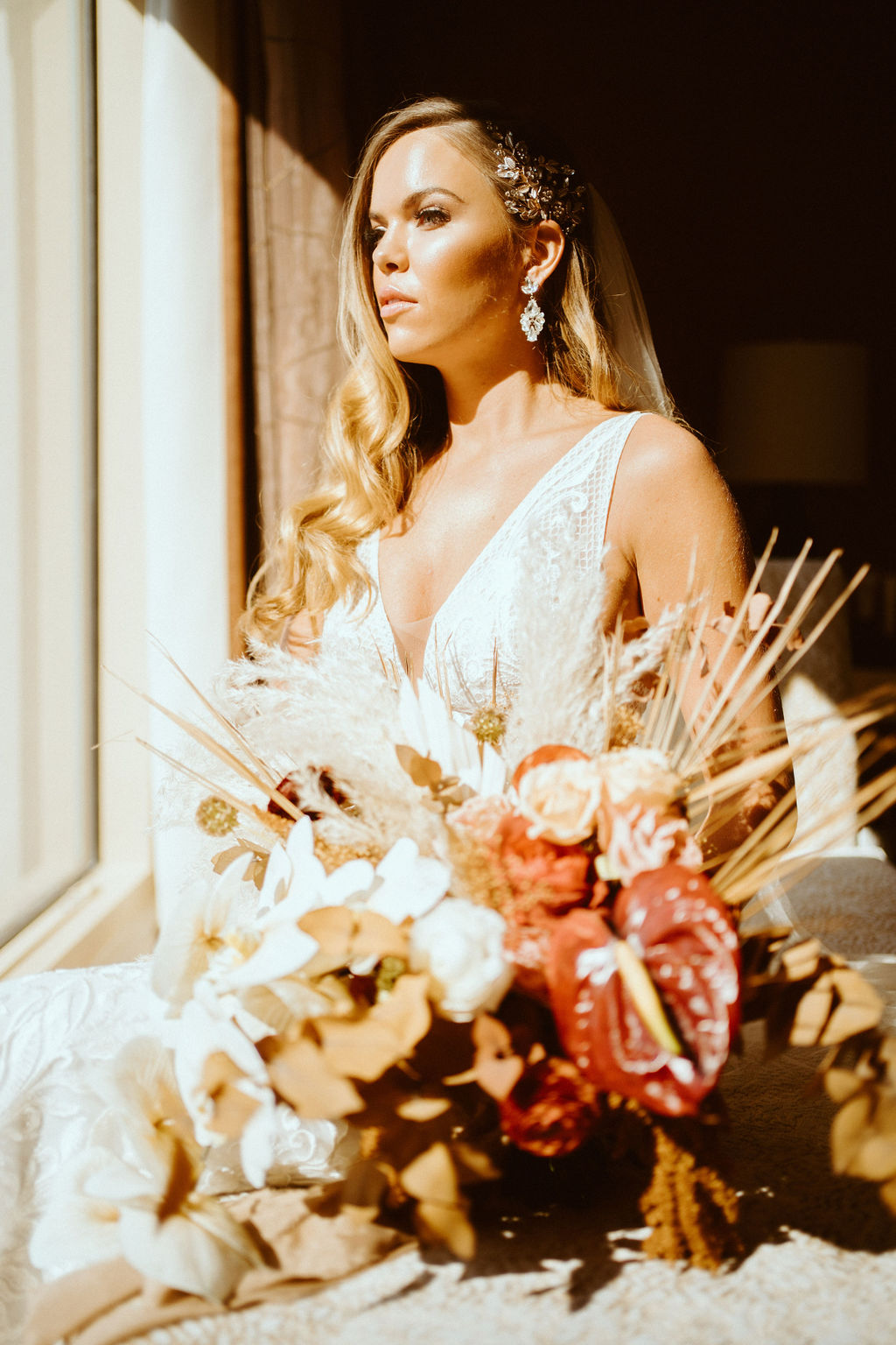 Bride Sitting with Bouquet in Sunlight in Las Vegas 