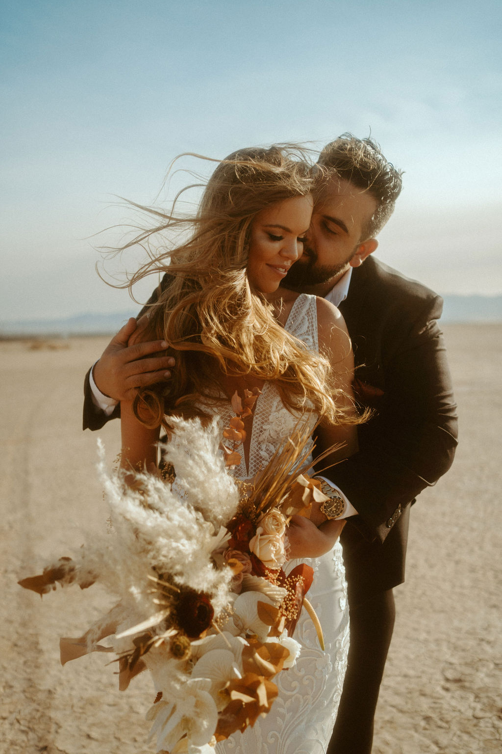 Bride and Groom at Dry Lake Bed Before Retro Disco Bohemian Micro-Wedding