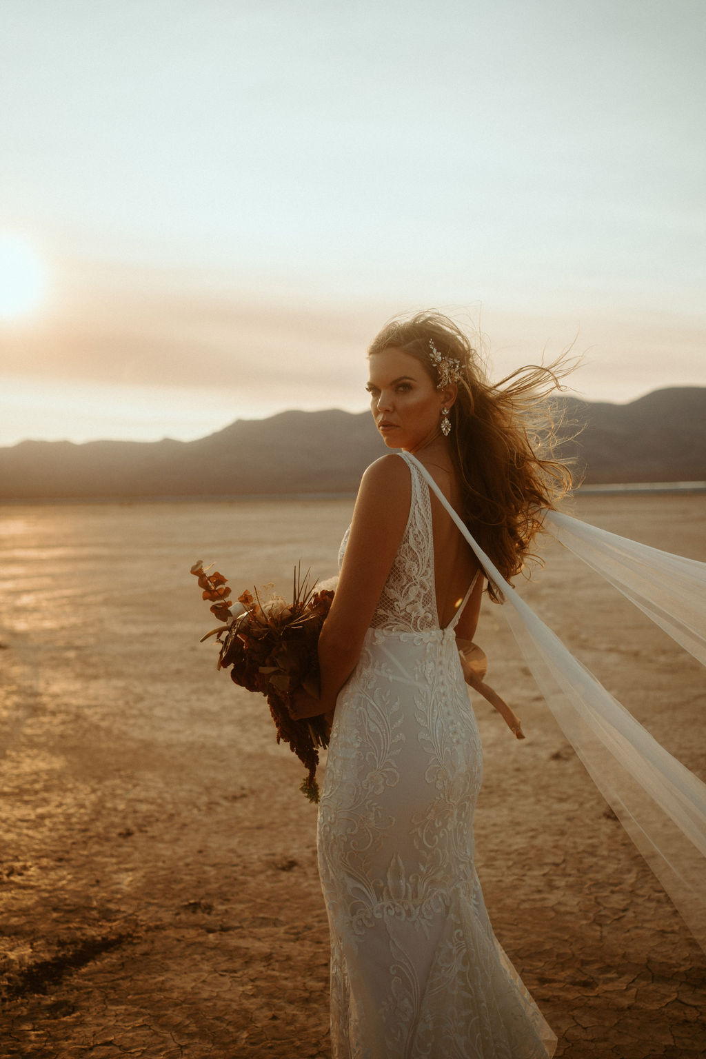 Bride with Statement Hair Piece and Bridal Cape in Las Vegas 
