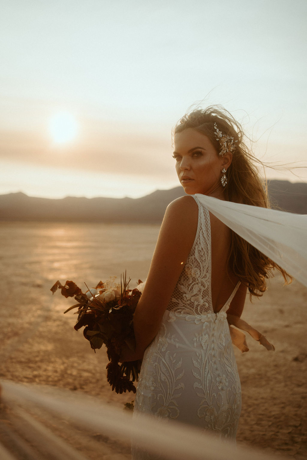 Bride with Statement Hair Piece and Bridal Cape 