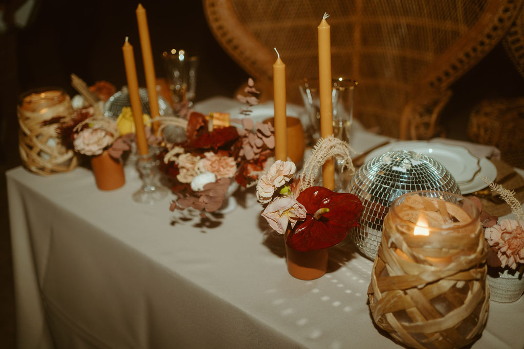 Disco Balls, Taper Candles, and Florals on Sweetheart Table 