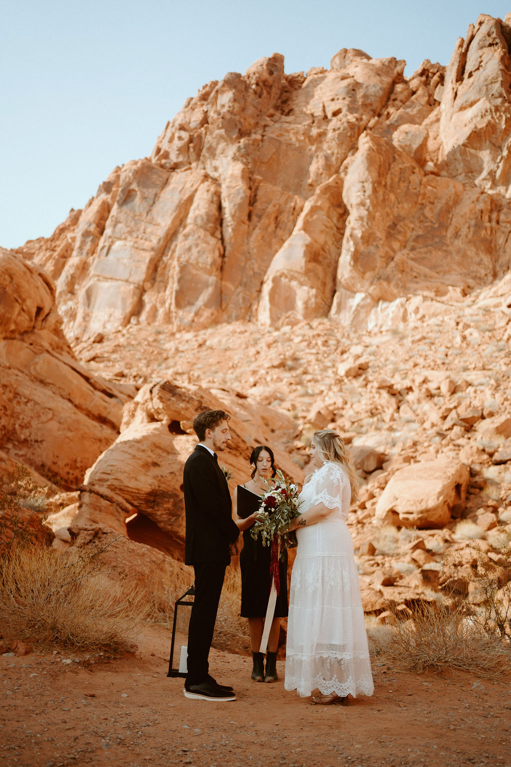 Bride & Groom Standing at Altar during Rolling out in Style in the Desert Elopement Near Las Vegas 
