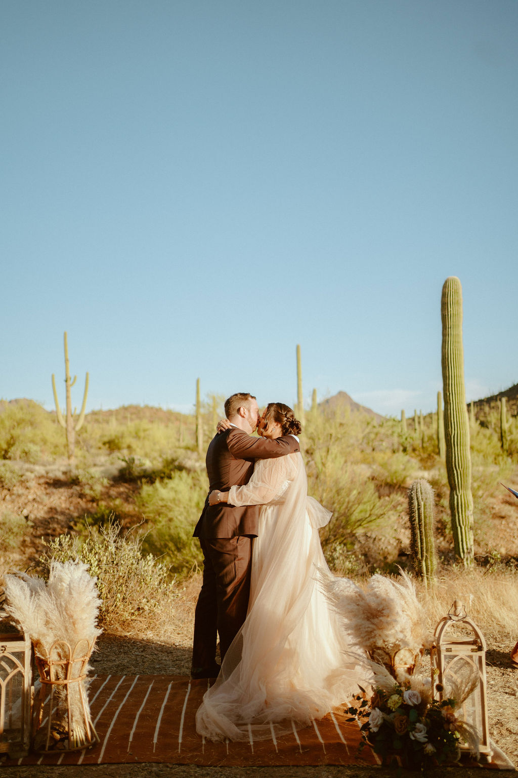 Saguaro National Park Micro-Wedding. The first kiss as Mr. & Mrs.