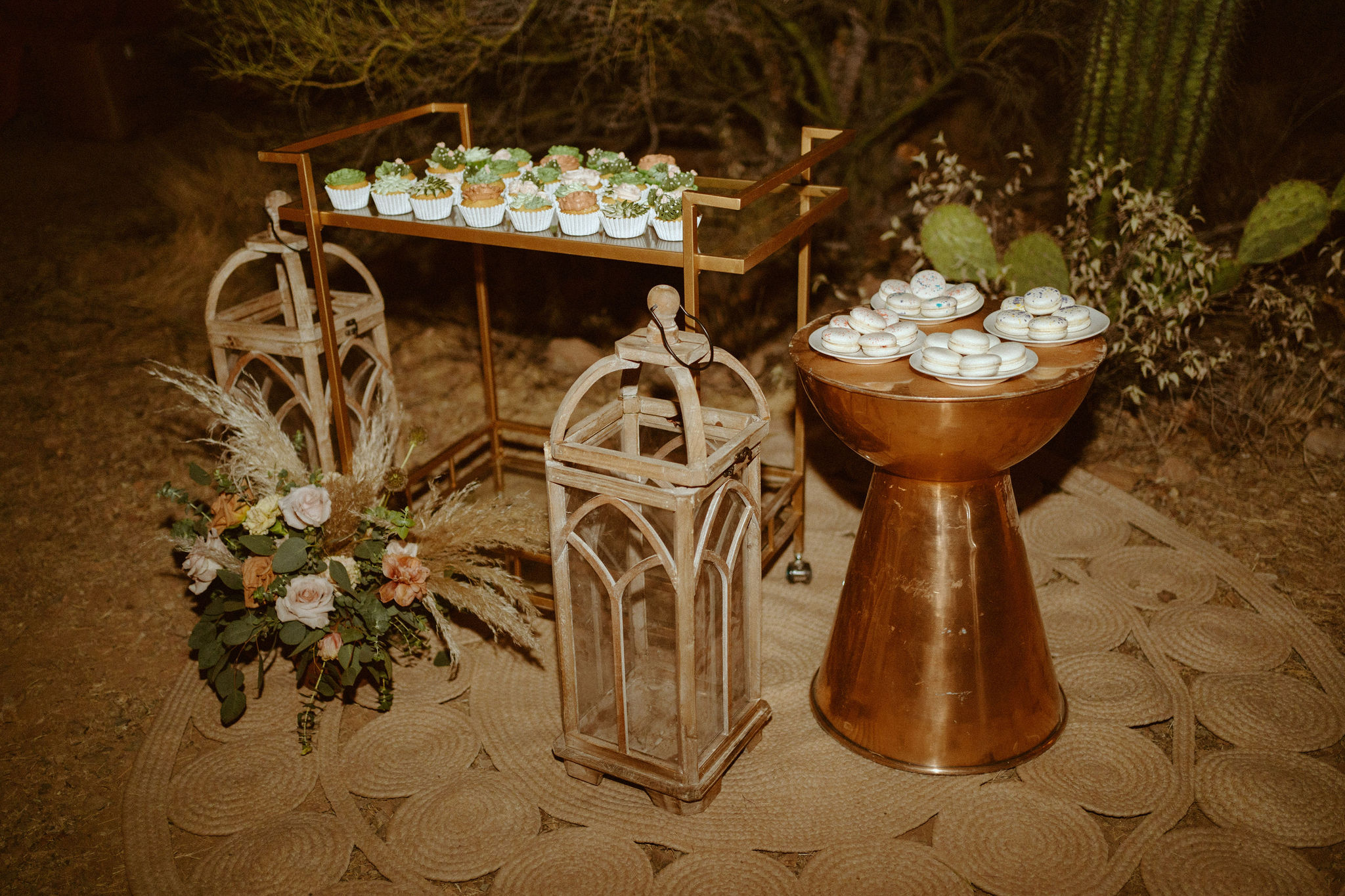 Dessert area with cute succulent style cupcakes and macaroons 