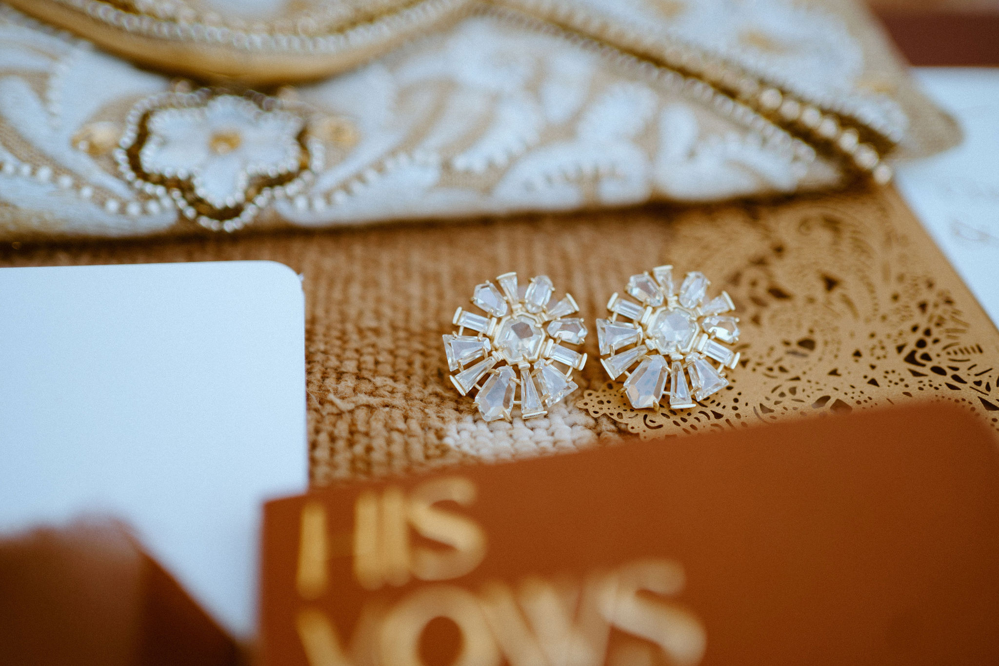The brides wedding day diamond earrings.