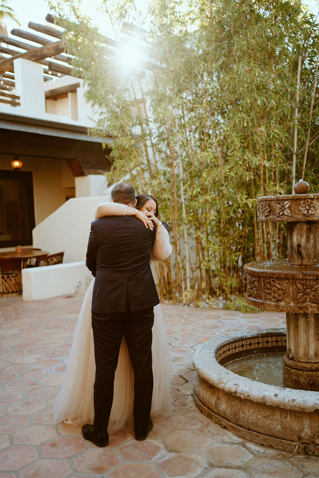 Saguaro National Park Micro-Wedding. Newlyweds hug as they see each other dressed up for the first look 
