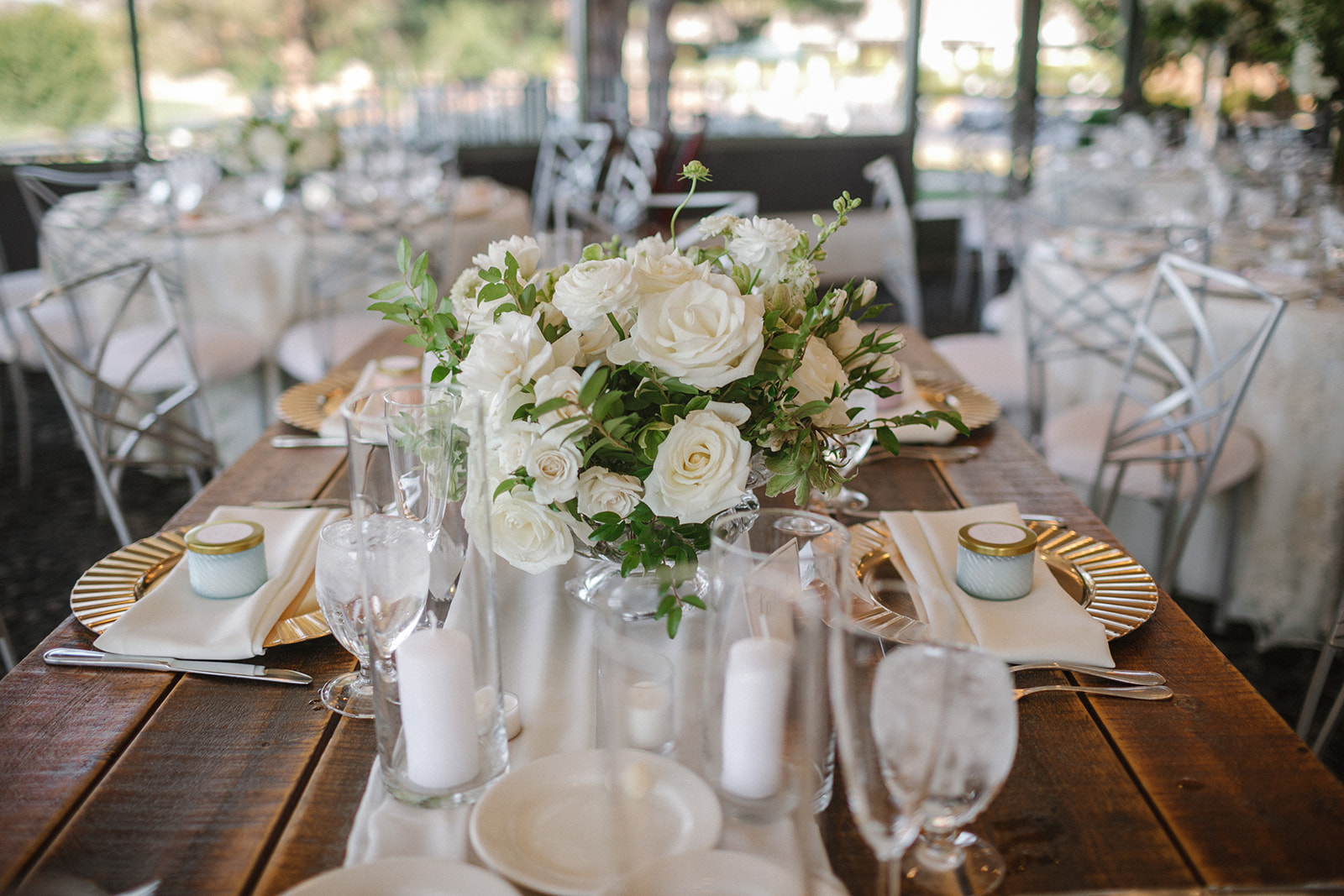 Gold Plates and White Roses for Wedding Reception 