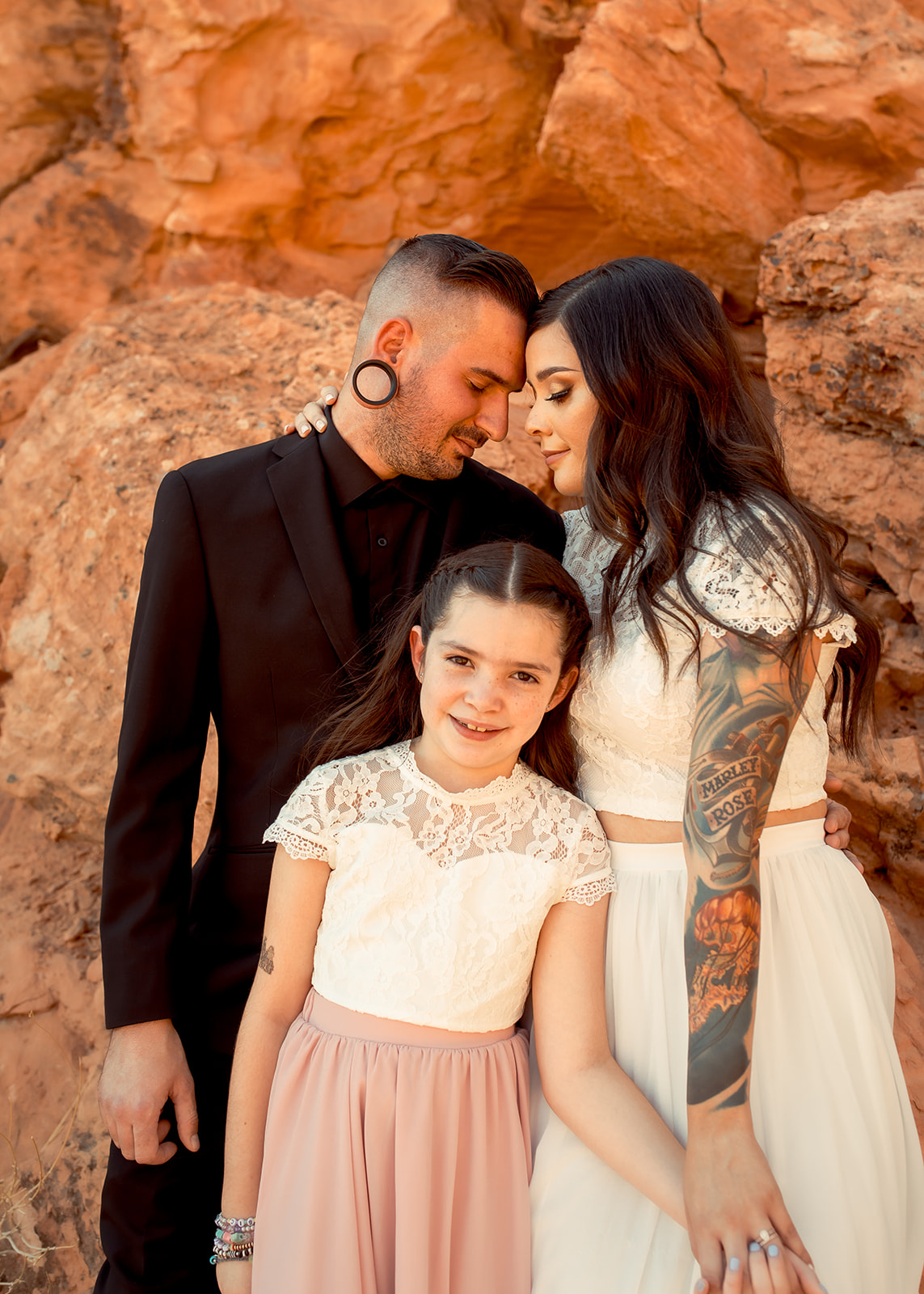 Bride and Groom with Daughter after Elopement