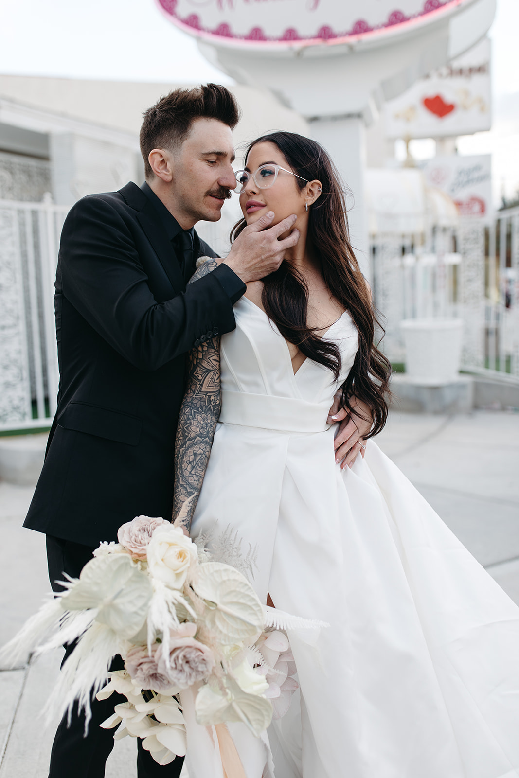 Newlyweds at Little White Chapel in Modern Wedding with Vegas Vibes 