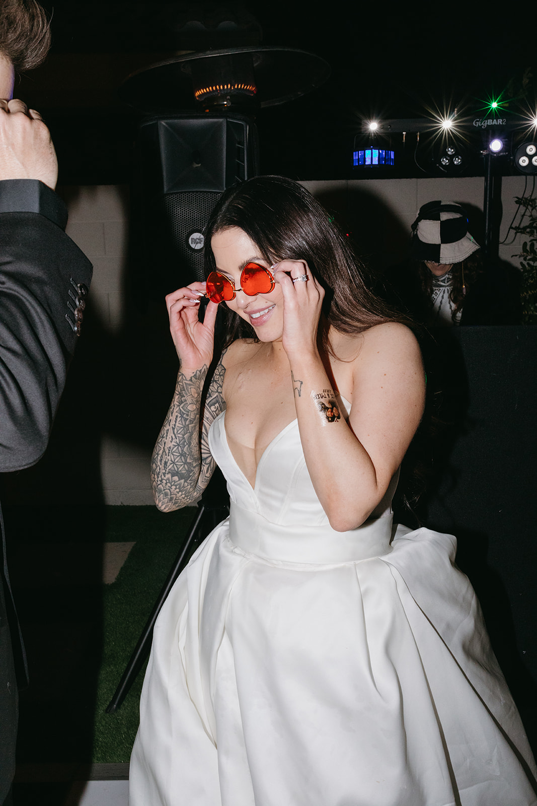 Bride wearing red glasses- the wedding favor for Las Vegas reception 