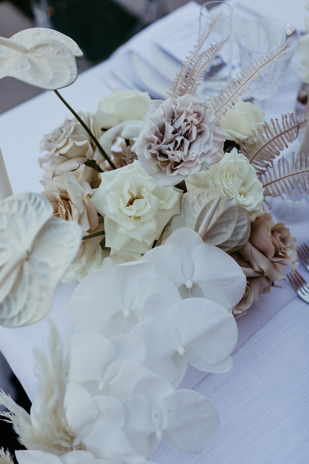 Romantic and Modern Reception Florals with White Orchids & White Anthurium 