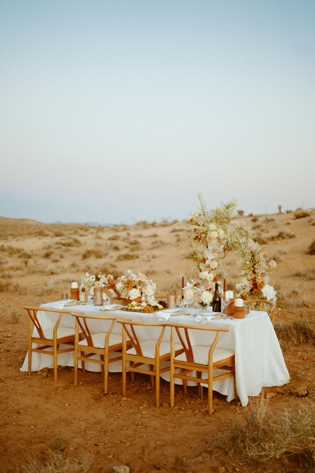 Sweetheart table set up in the middle of the desert at ash springs 