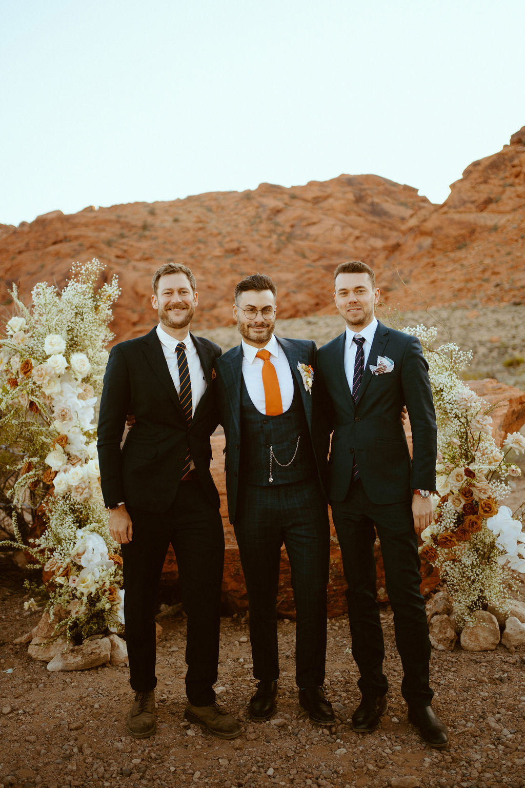 The groom with the grooms men at the altar. 