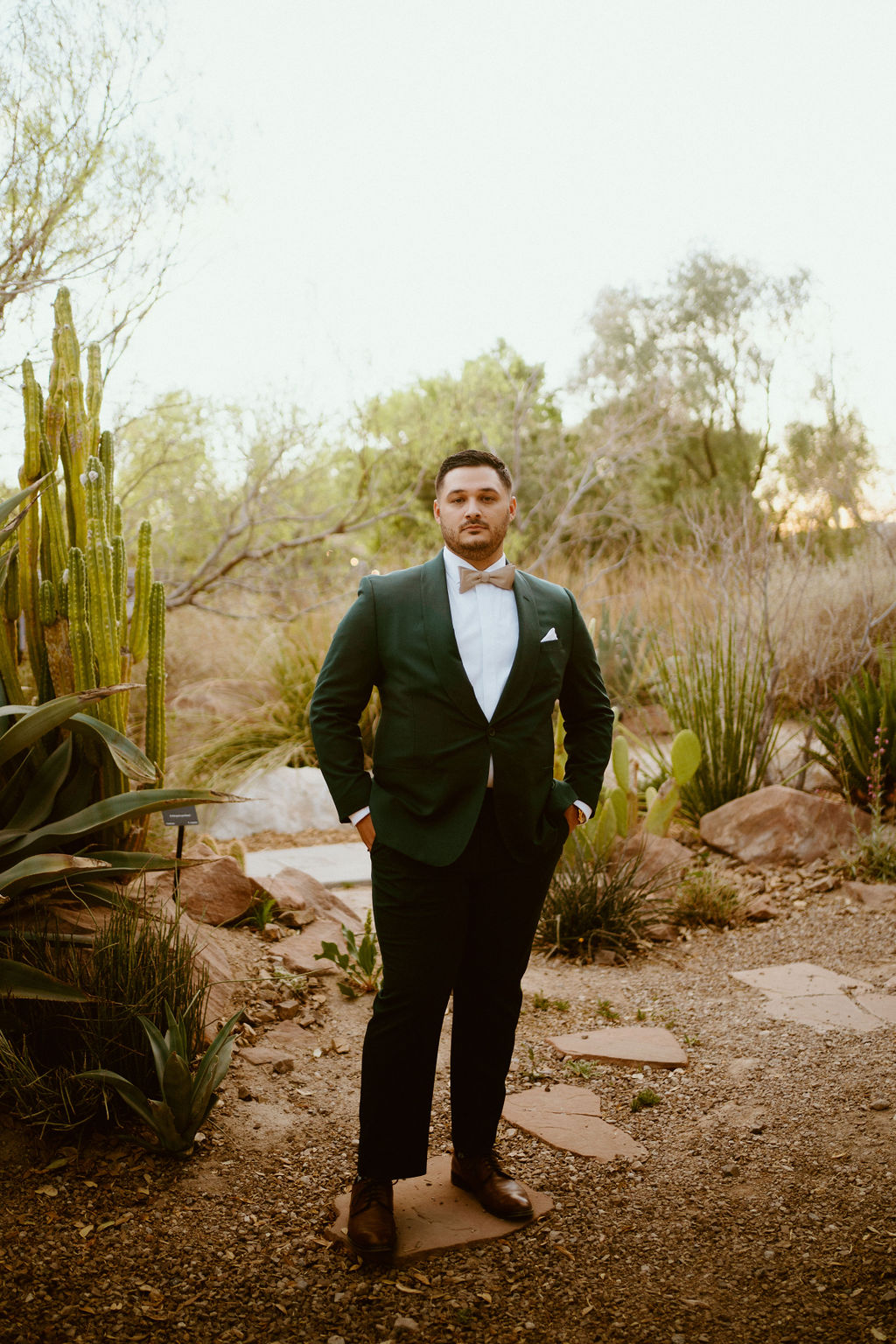 Groom in suit and bow-tie for Springs Preserve Greenery Elopement