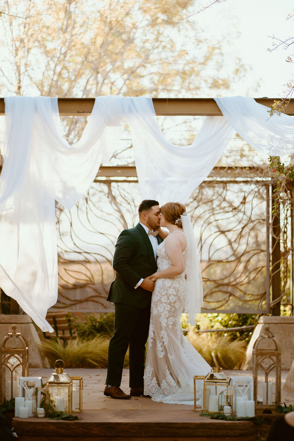 Newlyweds first kiss for Springs Preserve Greenery Elopement
