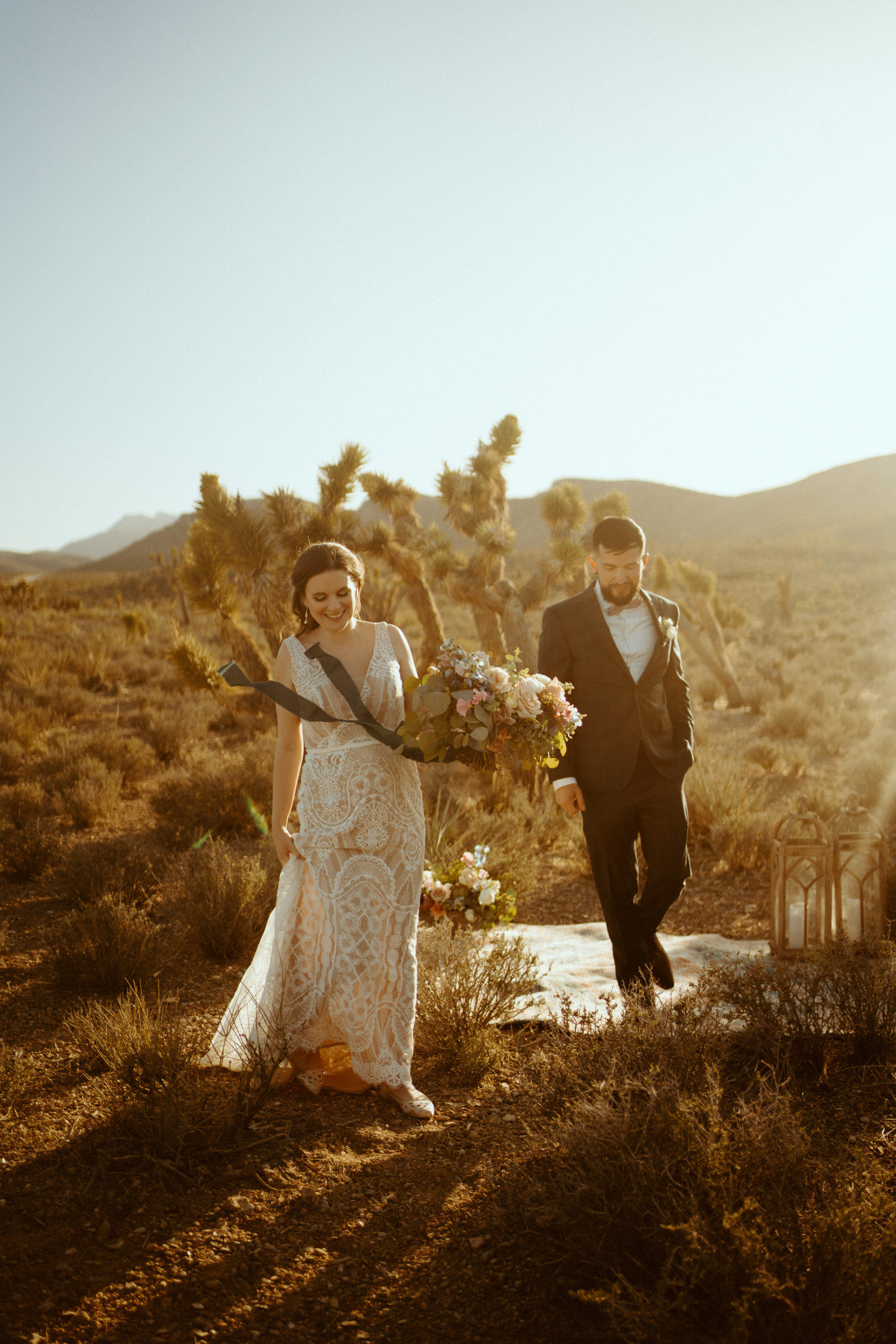 Couple eloping with Joshua trees surrounding them for our Joshua Trees in Las Vegas? No Way Blog 