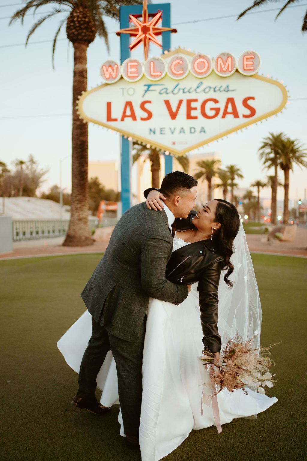 Bride and Groom in front of Welcome to Fabulous Las Vegas Nevada Sign during Las Vegas Highlights & Desert Elopement