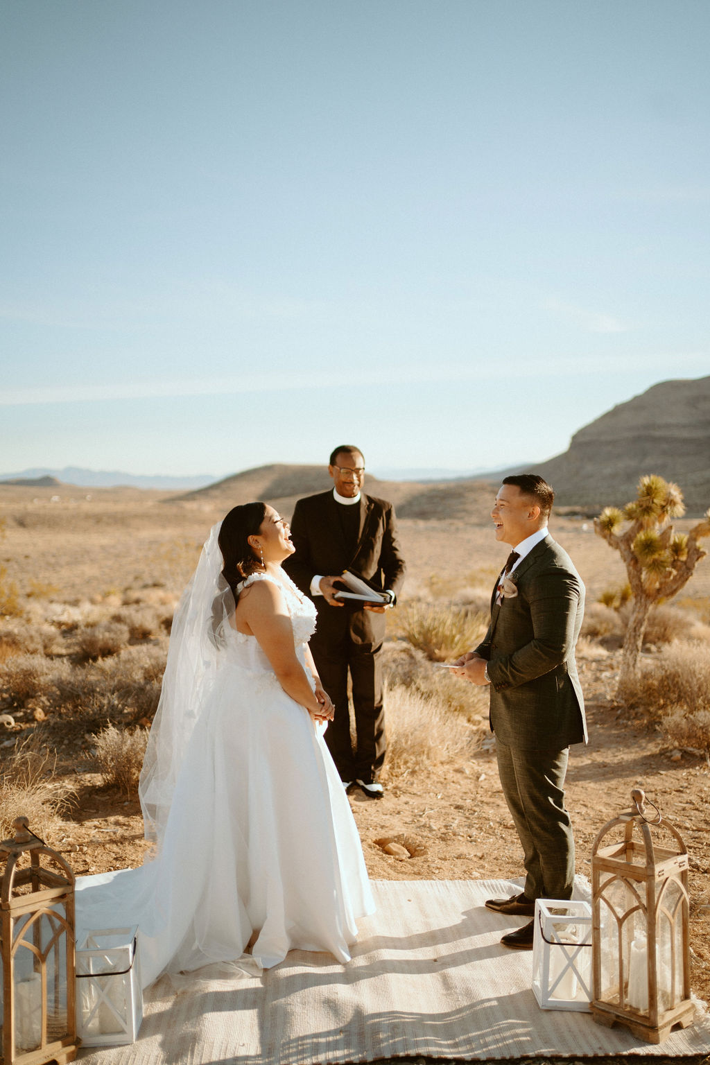 Couple laughing during elopement ceremony just outside of Las Vegas 