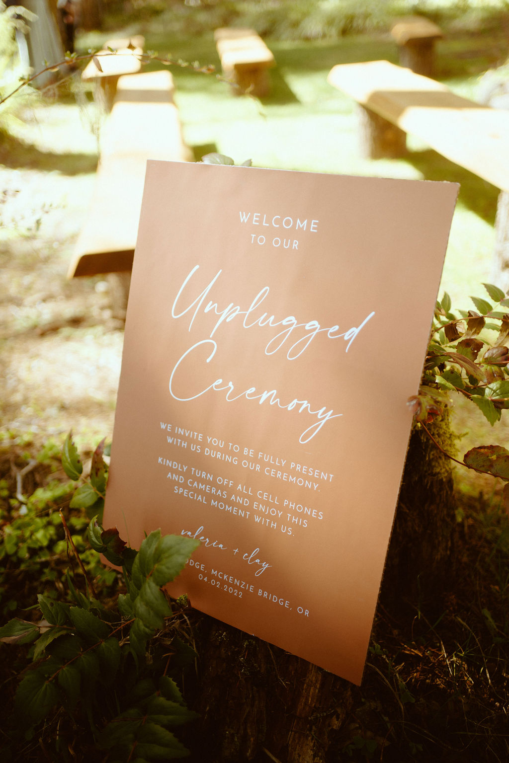 Welcome sign to the wedding were the bride and groom are asking to have an unplugged ceremony.