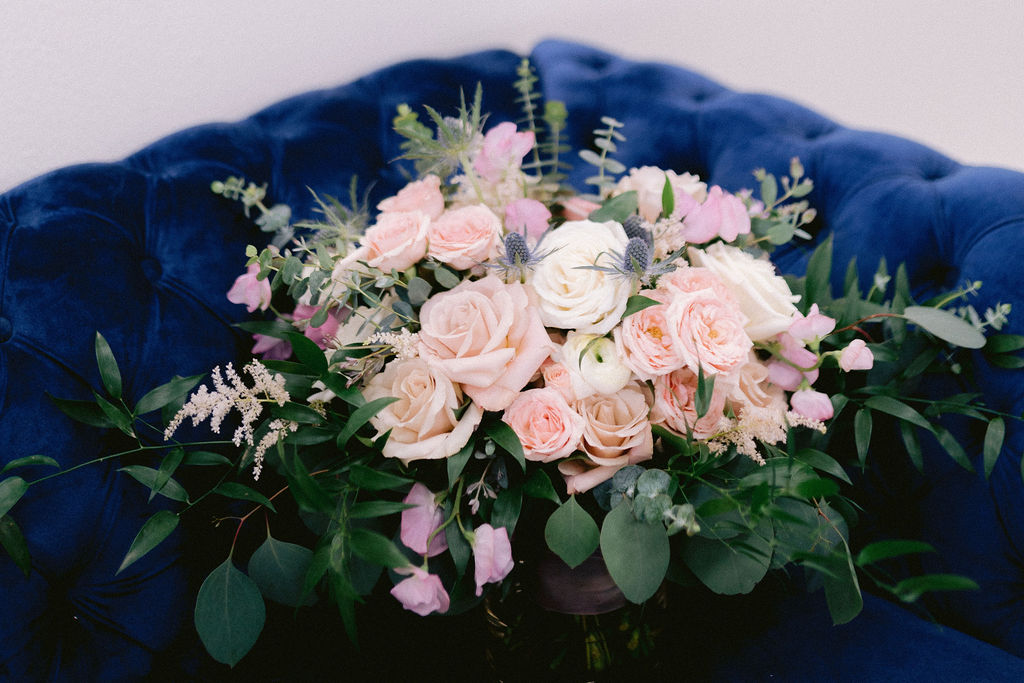Navy Blue & Blush Pink Micro-Wedding wedding bouquet of greenery and blush pink flowers. 