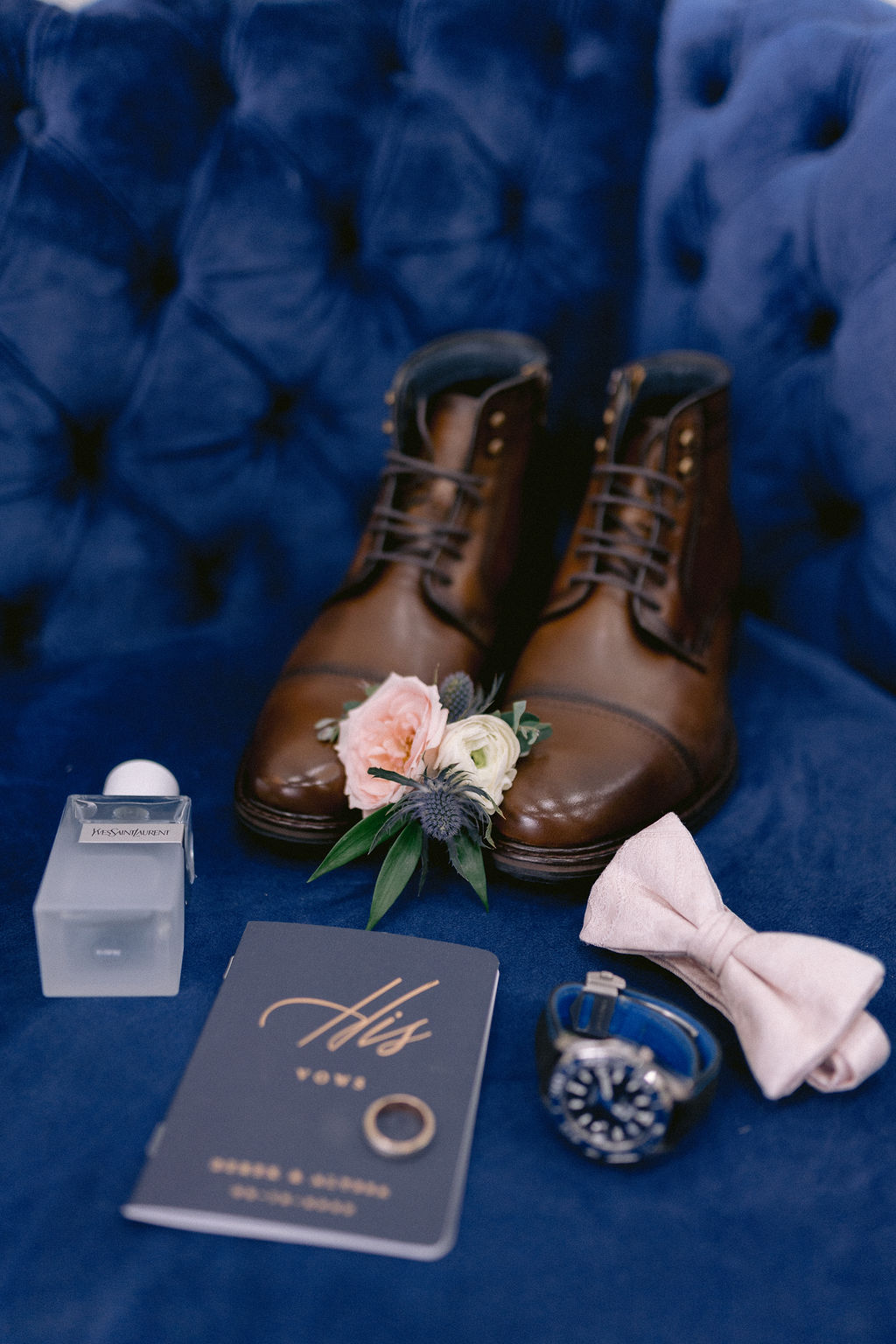 Navy Blue & Blush Pink Micro-Wedding grooms shoes with his bowtie, boutonniere and vow book. 