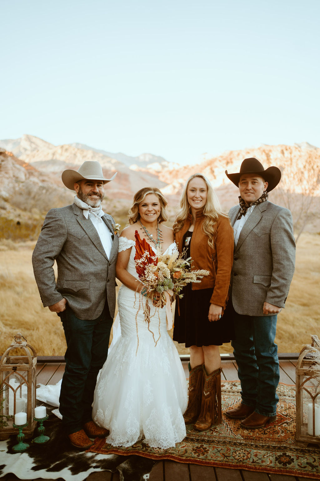 Newlyweds with Guests in Western Inspired Turquoise Boho Elopement 