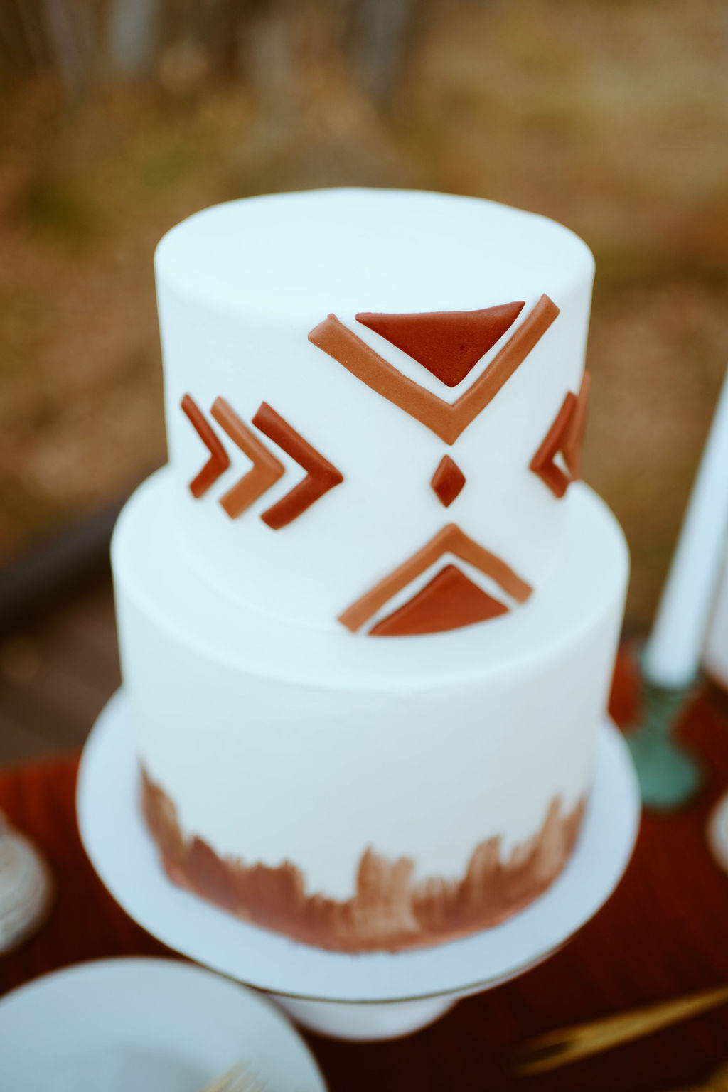 White and Terra-cotta Western Boho 2-tier Elopement Cake 