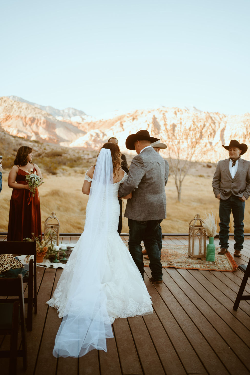 Bride in Veil and Mermaid Dress Arriving at Altar during Western Inspired Turquoise Boho Elopement 