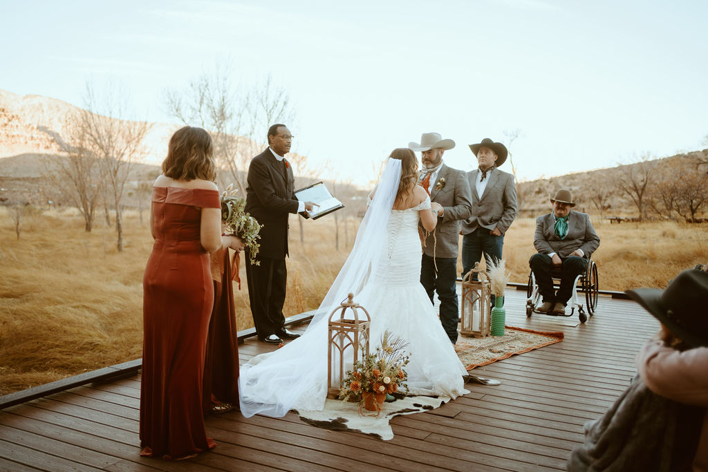 Bride and Groom at Altar during Las Vegas western boho themed elopement 