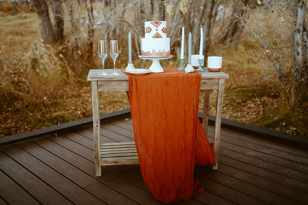 White and Terra-cotta Cake Table for Western Inspired Turquoise Boho Elopement 