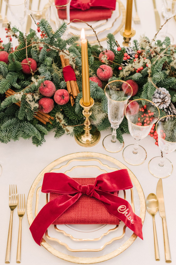 How to Style the perfect Holiday Table! Classic Christmas table setting with reds, green, and gold.