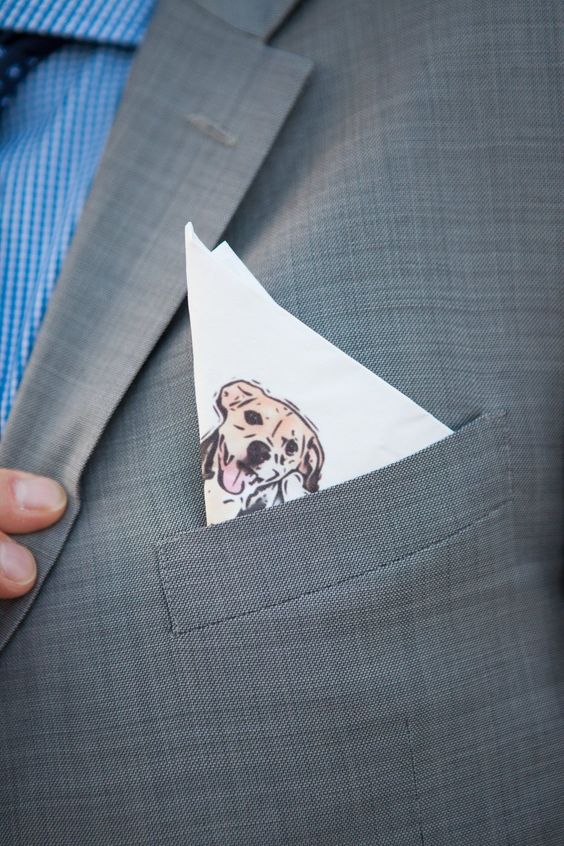 How To Include Your Dog on Your Wedding Day!. Groom wearing a custom pocket square embroidered with his dog. 