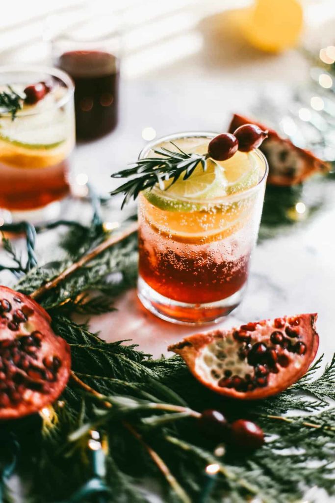 Holiday drink with citrus and cranberry 