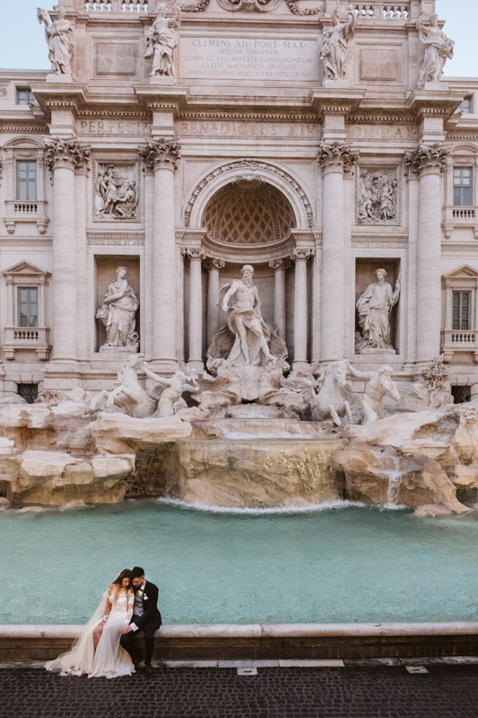 Top 10 Destination Wedding Locations for 2023! Beautiful elopement at the Trevi fountain in Rome, Italy.