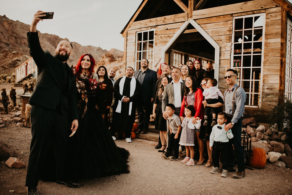 Newlyweds taking selfie with their guests at Nelson's Ghost Town 