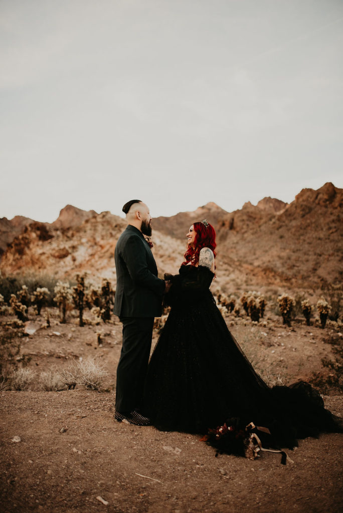 Couple Eloping Just outside of Las Vegas with Mountains in the background on Halloween 