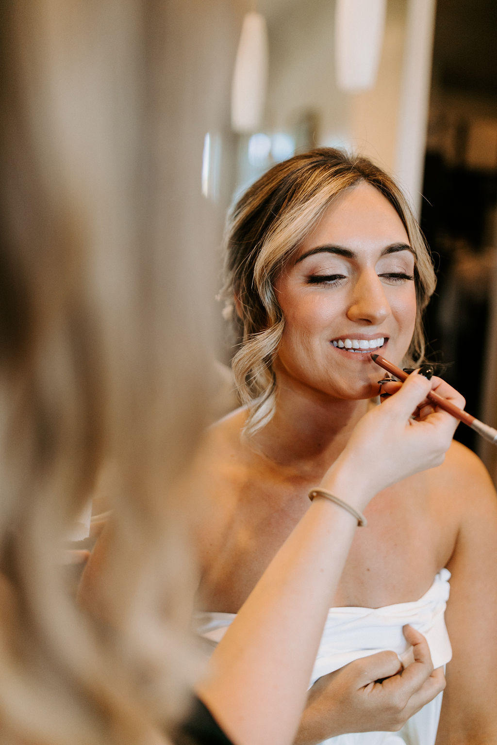 Bride getting her make-up done 