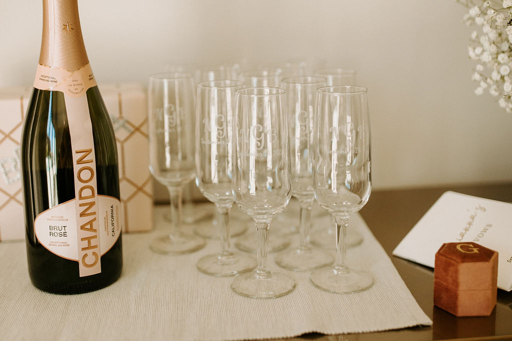 Champagne glasses and champagne for bridal party 