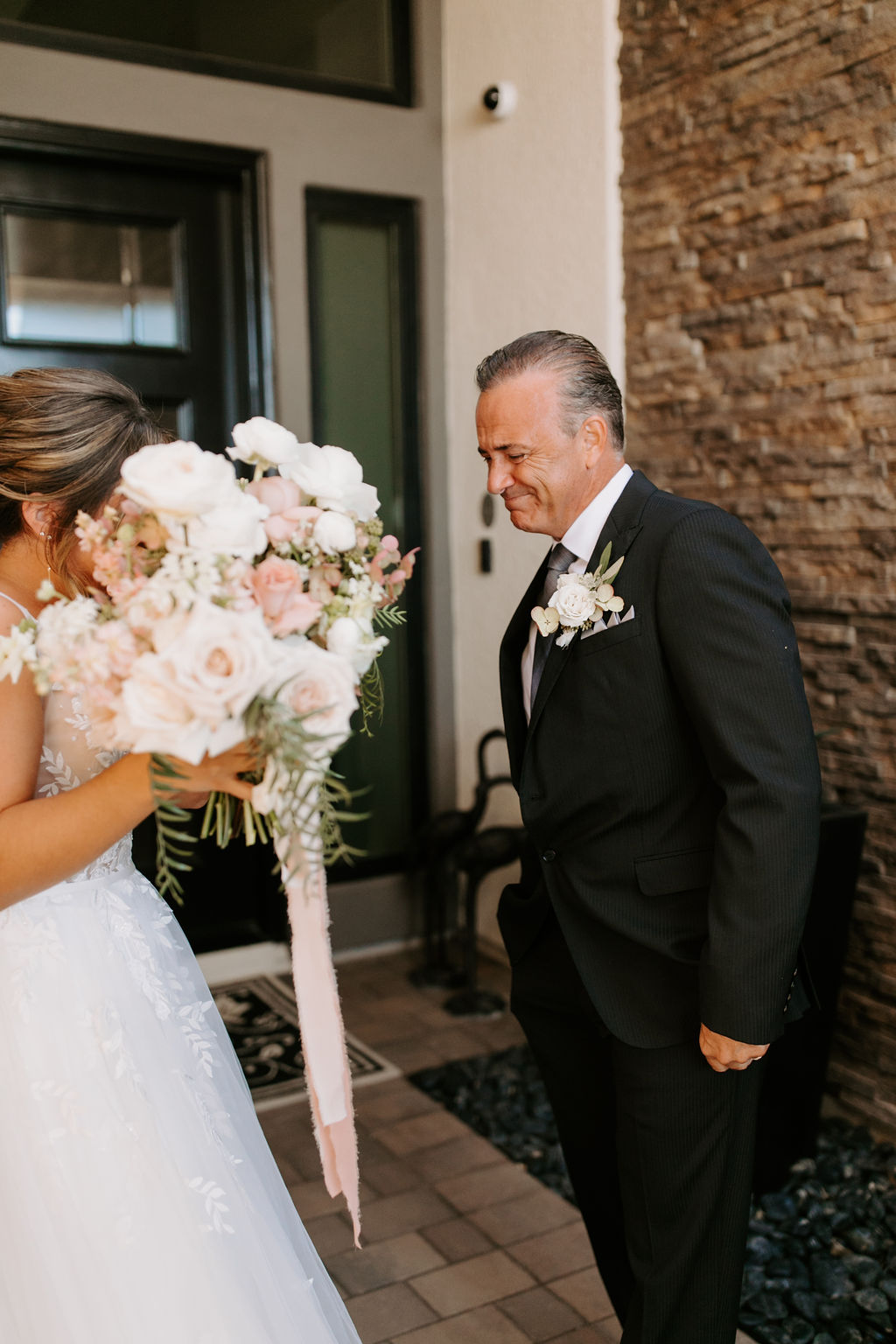 Father reacting to bride 