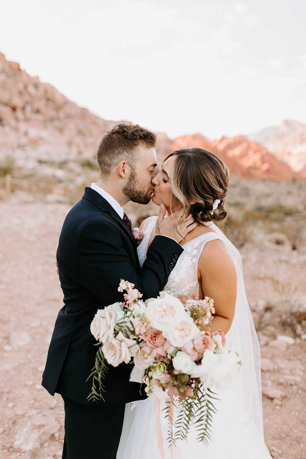 Bride and Groom Kissing in Red Rock Canyon 