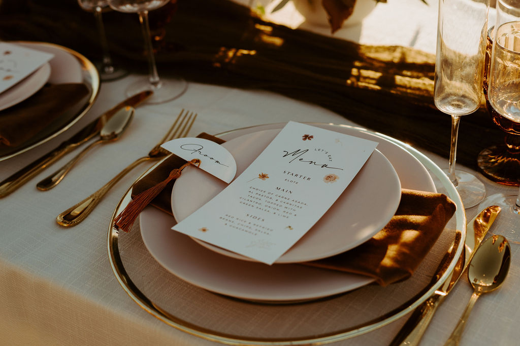 Menu Car with Terracotta Napkin and Blush Plates and Gold Flatware for Wedding Sweetheart Table