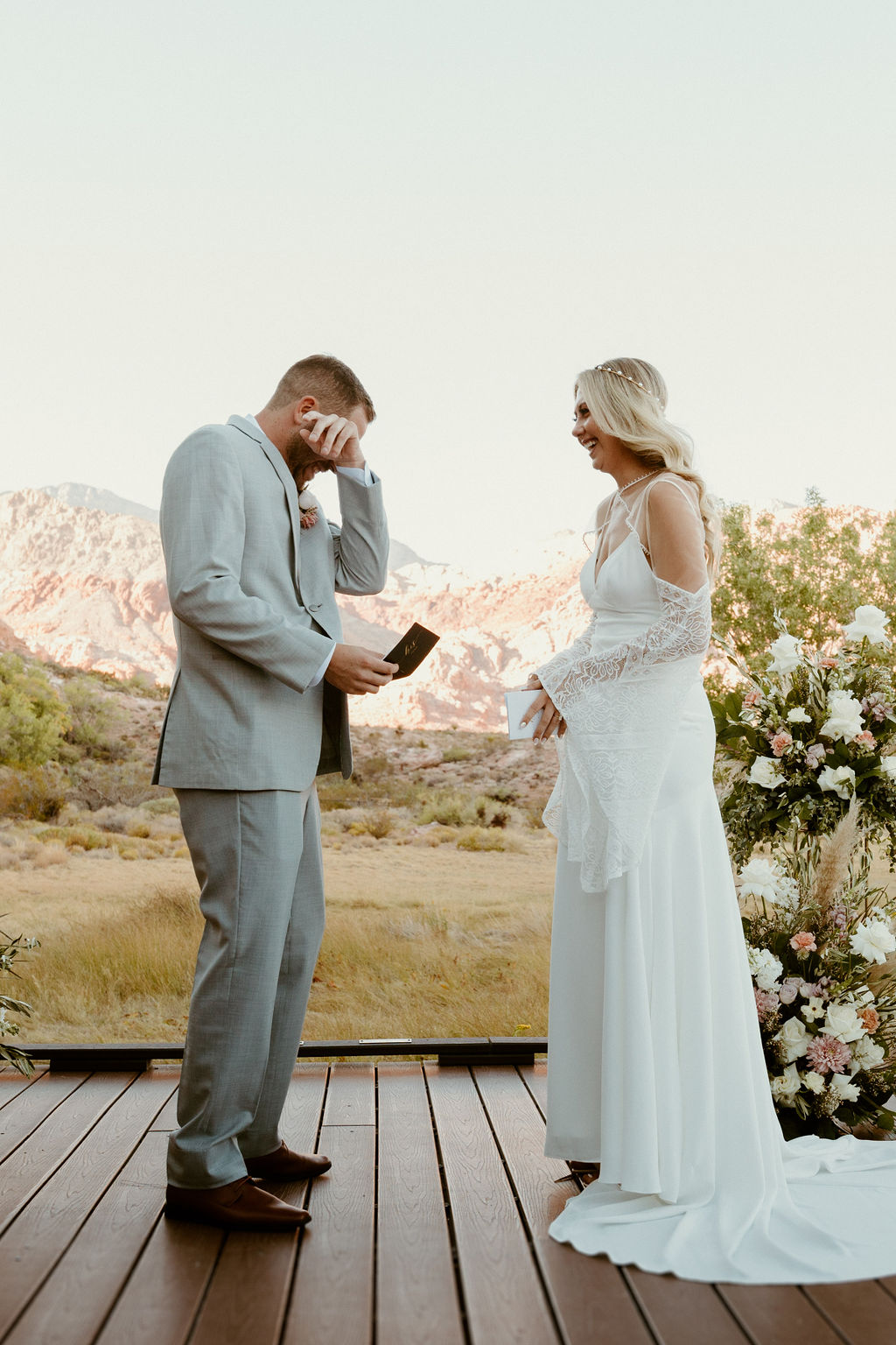 Red Rock Desert & Neon Vegas Lights. The groom reading his personal vows and tearing up 