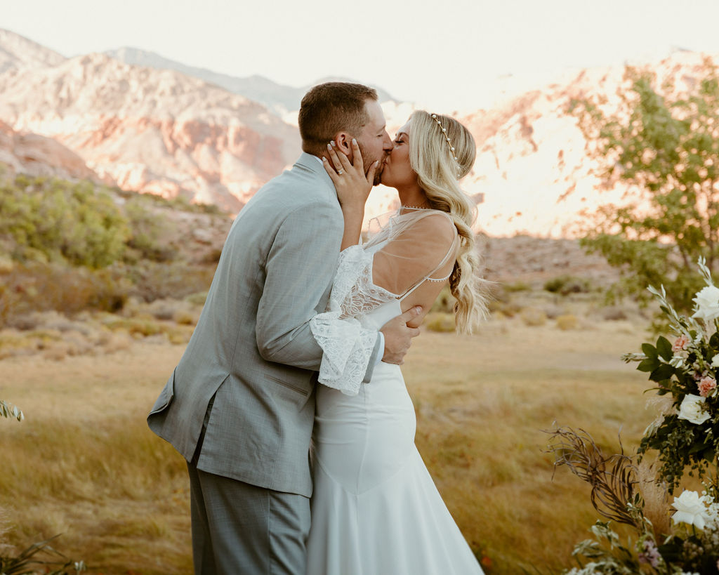 Red Rock Desert & Neon Vegas Lights. First kiss as the new Mr. & Mrs. 