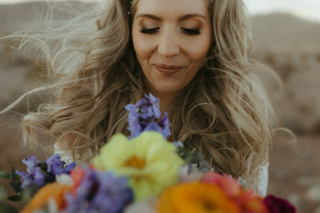 Up close photo of the bride and her colorful unique wedding bouquet 