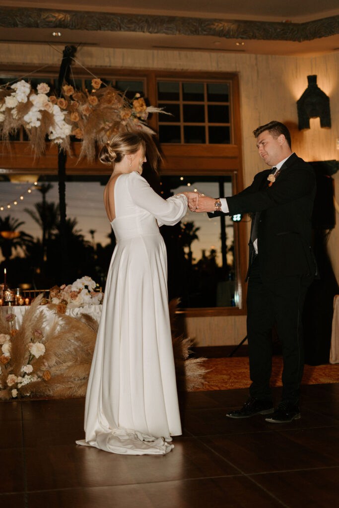 Bride and groom sharing their first dance. 